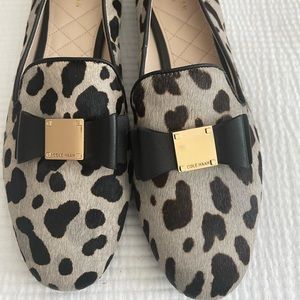 The Tali Bow Loafer features a pretty bow with signature hardware detailing